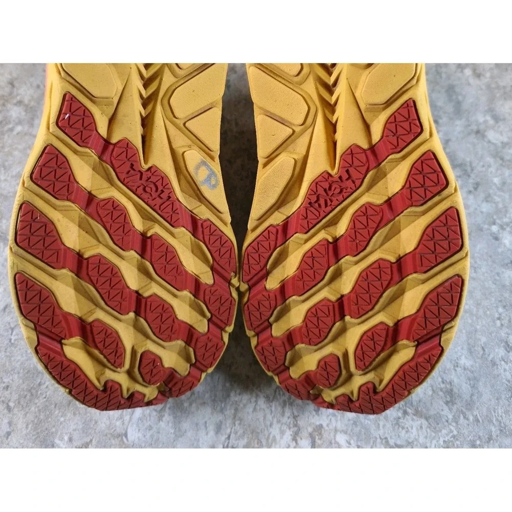 Hoka One One Women's Light Blue Running Shoes with Yellow and Orange Midsole